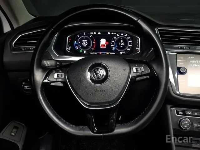 Білий Фольксваген Тігуан, об'ємом двигуна 2 л та пробігом 41 тис. км за 18000 $, фото 5 на Automoto.ua