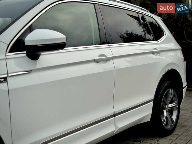 Білий Фольксваген Тігуан, об'ємом двигуна 2 л та пробігом 186 тис. км за 29999 $, фото 23 на Automoto.ua