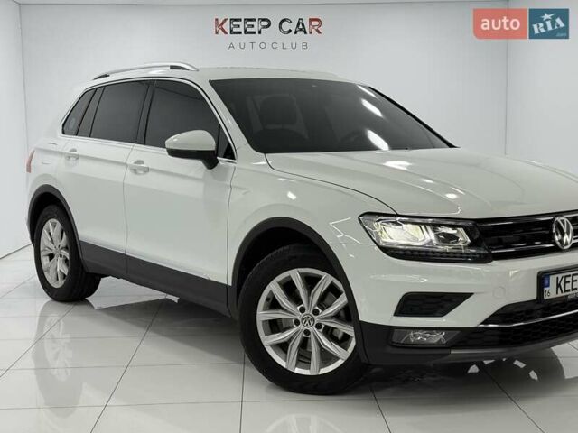 Білий Фольксваген Тігуан, об'ємом двигуна 1.97 л та пробігом 40 тис. км за 31500 $, фото 2 на Automoto.ua