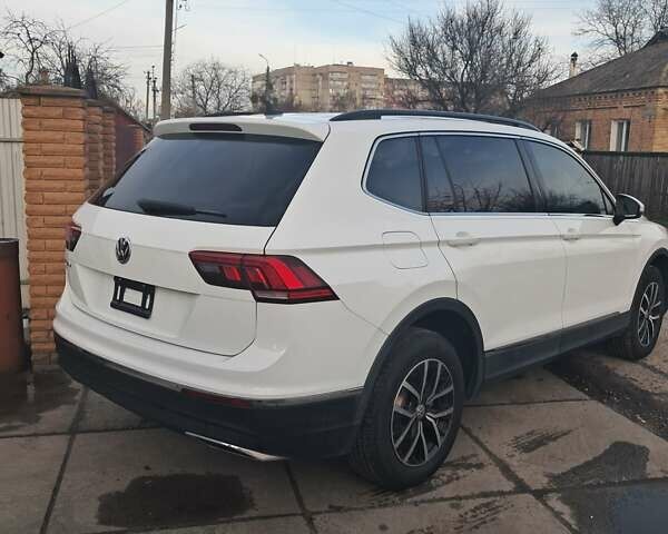 Білий Фольксваген Тігуан, об'ємом двигуна 2 л та пробігом 142 тис. км за 17200 $, фото 6 на Automoto.ua