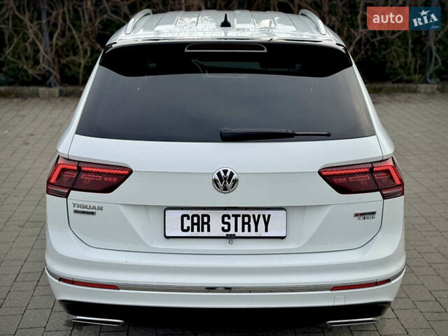 Білий Фольксваген Тігуан, об'ємом двигуна 2 л та пробігом 186 тис. км за 29999 $, фото 27 на Automoto.ua