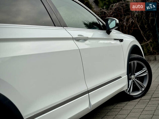 Білий Фольксваген Тігуан, об'ємом двигуна 2 л та пробігом 186 тис. км за 29999 $, фото 30 на Automoto.ua