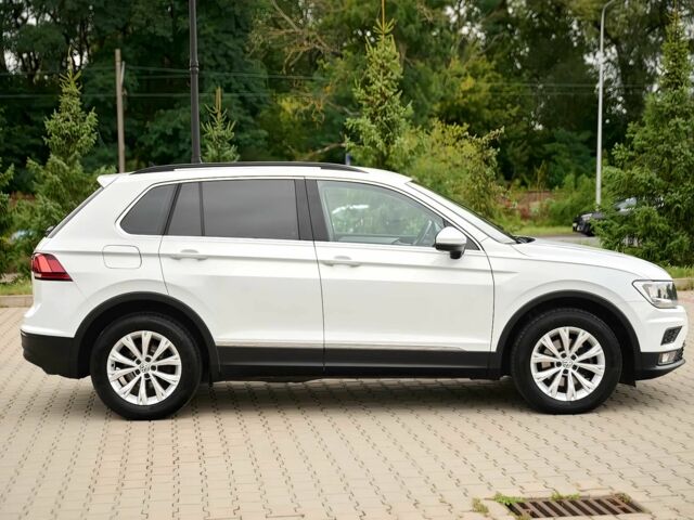 Білий Фольксваген Тігуан, об'ємом двигуна 2 л та пробігом 32 тис. км за 9800 $, фото 6 на Automoto.ua