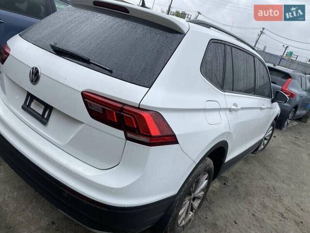 Білий Фольксваген Тігуан, об'ємом двигуна 2 л та пробігом 149 тис. км за 11300 $, фото 2 на Automoto.ua