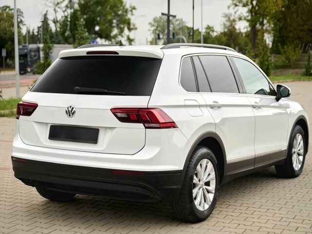 Білий Фольксваген Тігуан, об'ємом двигуна 2 л та пробігом 32 тис. км за 9800 $, фото 3 на Automoto.ua