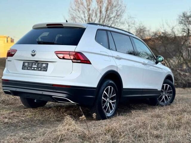Білий Фольксваген Тігуан, об'ємом двигуна 8 л та пробігом 75 тис. км за 14999 $, фото 8 на Automoto.ua