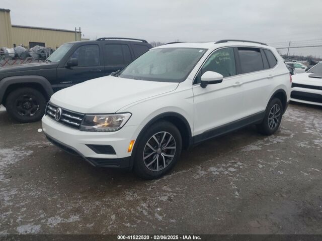 Білий Фольксваген Тігуан, об'ємом двигуна 2 л та пробігом 77 тис. км за 11450 $, фото 2 на Automoto.ua