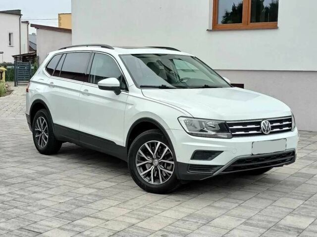 Білий Фольксваген Тігуан, об'ємом двигуна 2 л та пробігом 88 тис. км за 10300 $, фото 2 на Automoto.ua