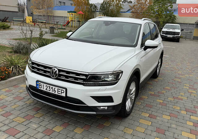 Білий Фольксваген Тігуан, об'ємом двигуна 1.97 л та пробігом 100 тис. км за 28500 $, фото 11 на Automoto.ua
