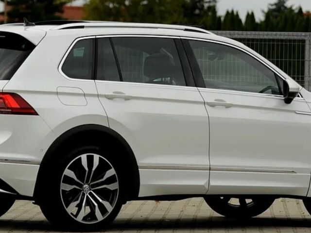 Белый Фольксваген Тигуан, объемом двигателя 2 л и пробегом 53 тыс. км за 13000 $, фото 2 на Automoto.ua