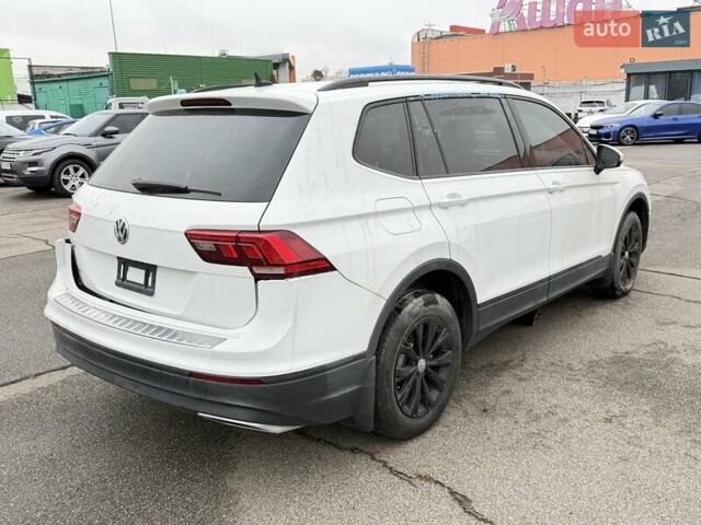 Белый Фольксваген Тигуан, объемом двигателя 2 л и пробегом 49 тыс. км за 12900 $, фото 2 на Automoto.ua