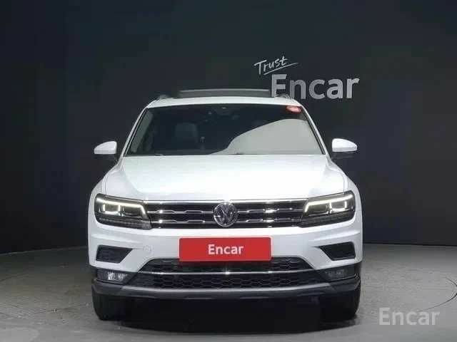 Білий Фольксваген Тігуан, об'ємом двигуна 2 л та пробігом 41 тис. км за 18000 $, фото 1 на Automoto.ua