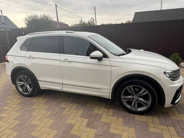 Белый Фольксваген Тигуан, объемом двигателя 2 л и пробегом 143 тыс. км за 19999 $, фото 3 на Automoto.ua