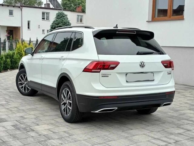 Білий Фольксваген Тігуан, об'ємом двигуна 2 л та пробігом 88 тис. км за 10300 $, фото 7 на Automoto.ua