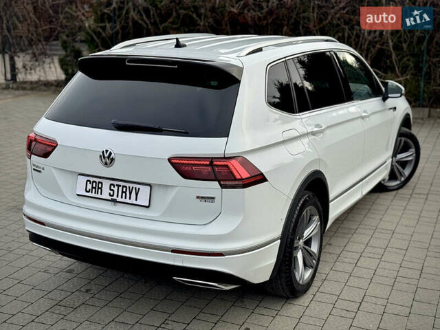 Білий Фольксваген Тігуан, об'ємом двигуна 2 л та пробігом 186 тис. км за 29999 $, фото 7 на Automoto.ua