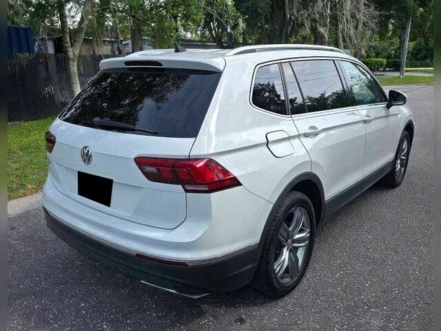 Белый Фольксваген Тигуан, объемом двигателя 2 л и пробегом 56 тыс. км за 8000 $, фото 3 на Automoto.ua