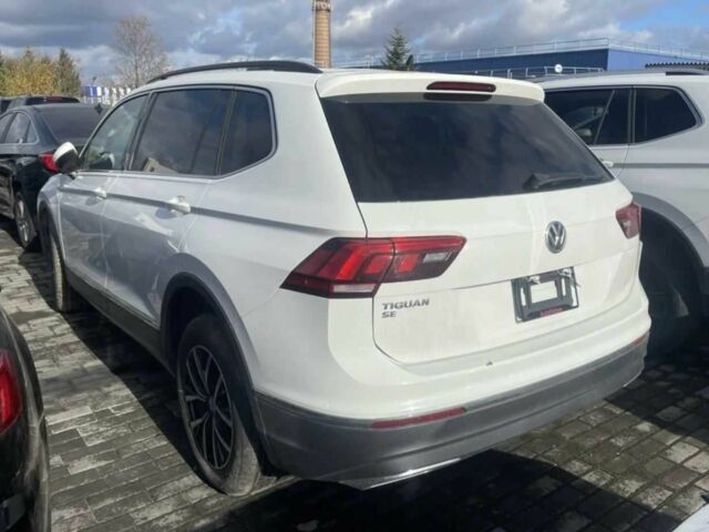 Белый Фольксваген Тигуан, объемом двигателя 2 л и пробегом 76 тыс. км за 14900 $, фото 3 на Automoto.ua