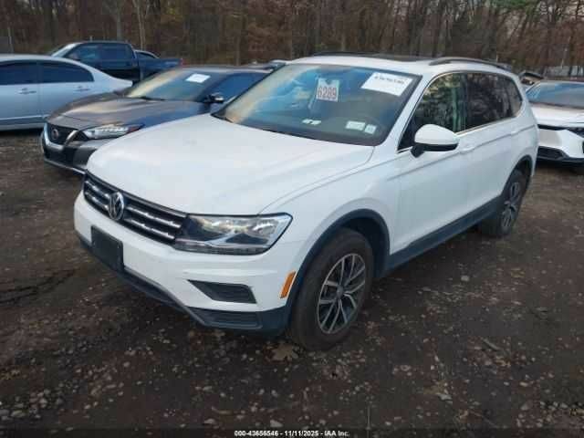 Белый Фольксваген Тигуан, объемом двигателя 2 л и пробегом 31 тыс. км за 5000 $, фото 2 на Automoto.ua