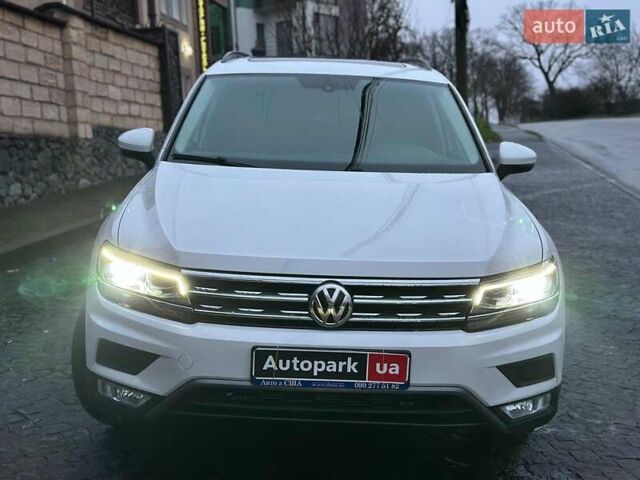 Белый Фольксваген Тигуан, объемом двигателя 2 л и пробегом 102 тыс. км за 21990 $, фото 1 на Automoto.ua