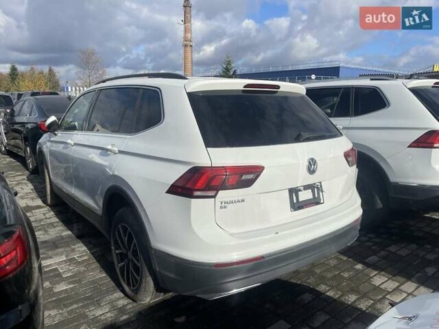 Белый Фольксваген Тигуан, объемом двигателя 2 л и пробегом 76 тыс. км за 14900 $, фото 1 на Automoto.ua