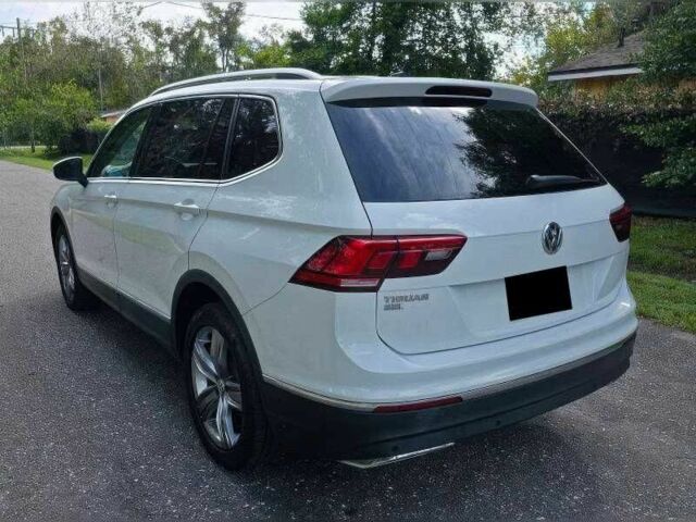 Белый Фольксваген Тигуан, объемом двигателя 2 л и пробегом 56 тыс. км за 8000 $, фото 4 на Automoto.ua