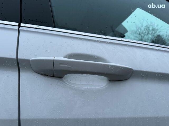 Белый Фольксваген Тигуан, объемом двигателя 2 л и пробегом 102 тыс. км за 21990 $, фото 21 на Automoto.ua