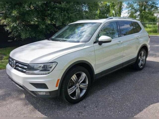 Белый Фольксваген Тигуан, объемом двигателя 2 л и пробегом 56 тыс. км за 8000 $, фото 1 на Automoto.ua