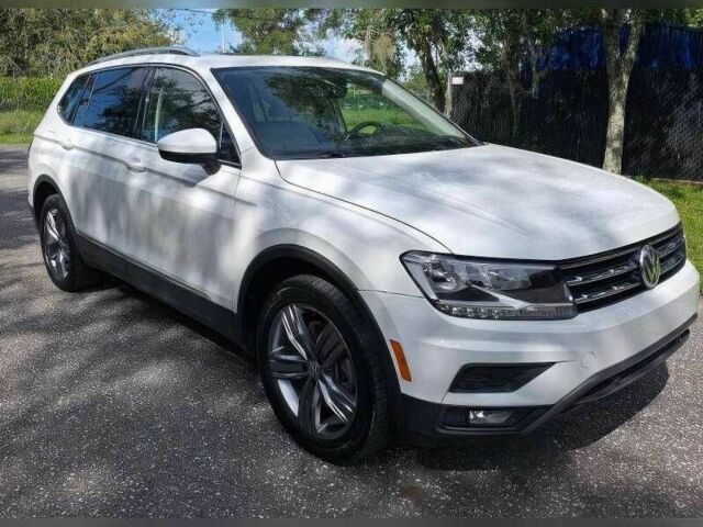 Белый Фольксваген Тигуан, объемом двигателя 2 л и пробегом 56 тыс. км за 8000 $, фото 2 на Automoto.ua