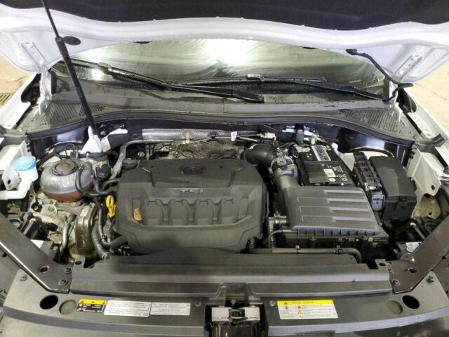 Білий Фольксваген Тігуан, об'ємом двигуна 2 л та пробігом 58 тис. км за 9000 $, фото 11 на Automoto.ua