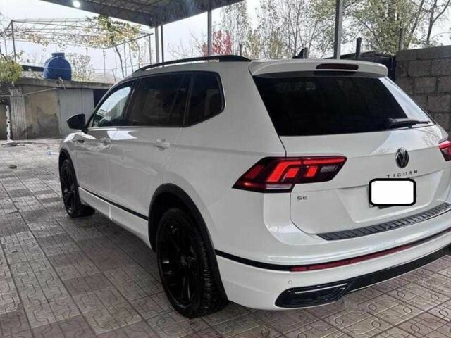 Білий Фольксваген Тігуан, об'ємом двигуна 2 л та пробігом 59 тис. км за 355 $, фото 9 на Automoto.ua