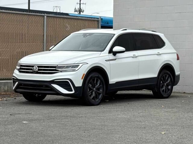 Білий Фольксваген Тігуан, об'ємом двигуна 2 л та пробігом 25 тис. км за 7800 $, фото 2 на Automoto.ua