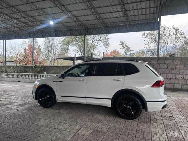 Білий Фольксваген Тігуан, об'ємом двигуна 2 л та пробігом 59 тис. км за 355 $, фото 6 на Automoto.ua