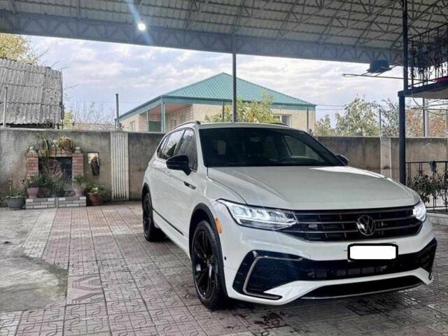 Білий Фольксваген Тігуан, об'ємом двигуна 2 л та пробігом 59 тис. км за 355 $, фото 2 на Automoto.ua