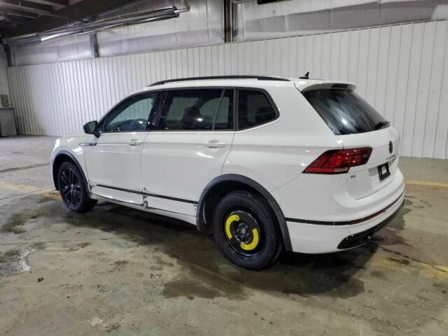 Білий Фольксваген Тігуан, об'ємом двигуна 2 л та пробігом 58 тис. км за 9000 $, фото 2 на Automoto.ua