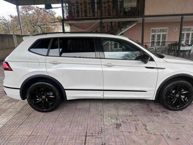 Білий Фольксваген Тігуан, об'ємом двигуна 2 л та пробігом 59 тис. км за 355 $, фото 3 на Automoto.ua