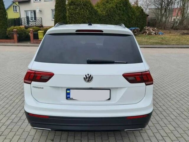 Білий Фольксваген Тігуан, об'ємом двигуна 2 л та пробігом 75 тис. км за 12400 $, фото 20 на Automoto.ua