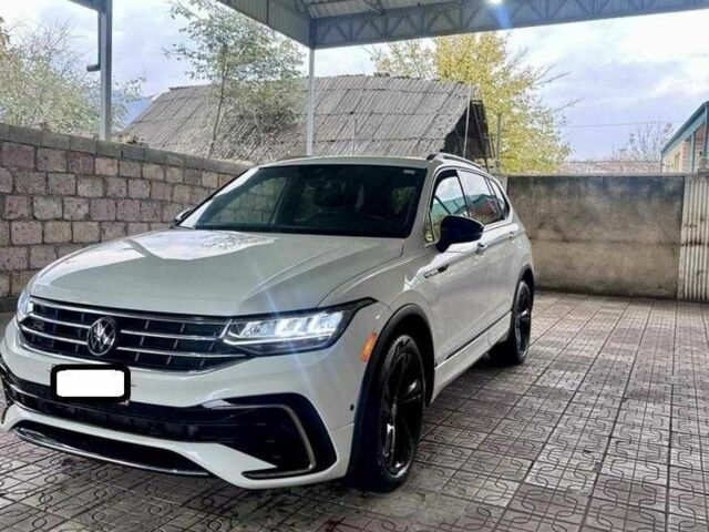 Білий Фольксваген Тігуан, об'ємом двигуна 2 л та пробігом 59 тис. км за 355 $, фото 1 на Automoto.ua