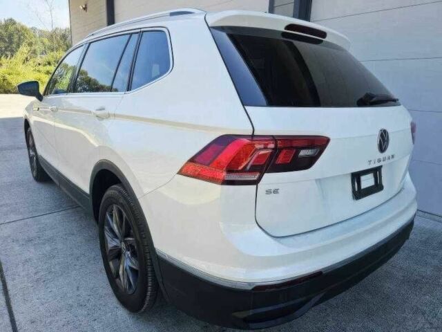 Белый Фольксваген Тигуан, объемом двигателя 2 л и пробегом 23 тыс. км за 12000 $, фото 4 на Automoto.ua