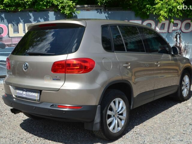 Бежевий Фольксваген Тігуан, об'ємом двигуна 1.4 л та пробігом 211 тис. км за 11500 $, фото 4 на Automoto.ua