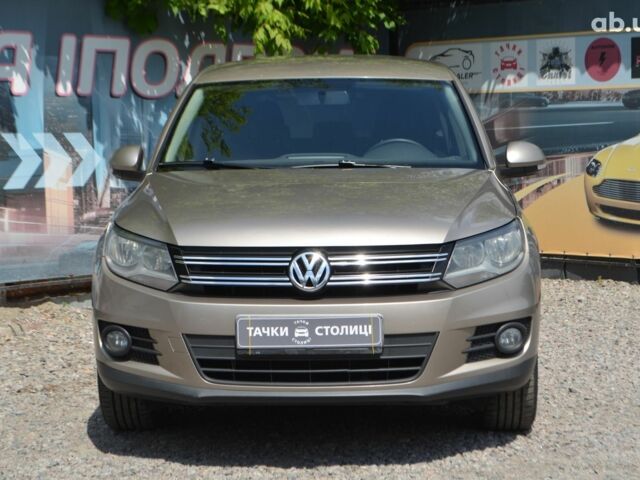 Бежевий Фольксваген Тігуан, об'ємом двигуна 1.4 л та пробігом 211 тис. км за 11500 $, фото 1 на Automoto.ua