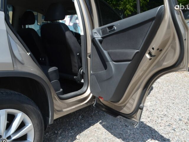 Бежевий Фольксваген Тігуан, об'ємом двигуна 1.4 л та пробігом 211 тис. км за 11500 $, фото 13 на Automoto.ua