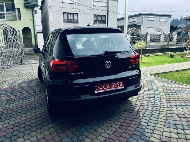 Черный Фольксваген Тигуан, объемом двигателя 2 л и пробегом 185 тыс. км за 9999 $, фото 2 на Automoto.ua