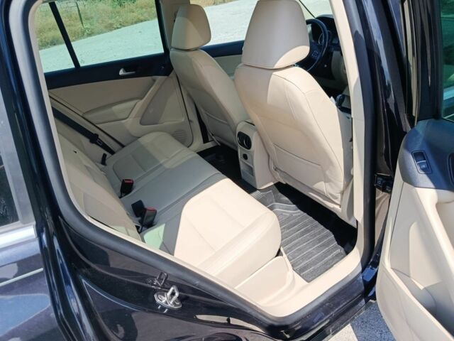 Черный Фольксваген Тигуан, объемом двигателя 2 л и пробегом 179 тыс. км за 11700 $, фото 12 на Automoto.ua