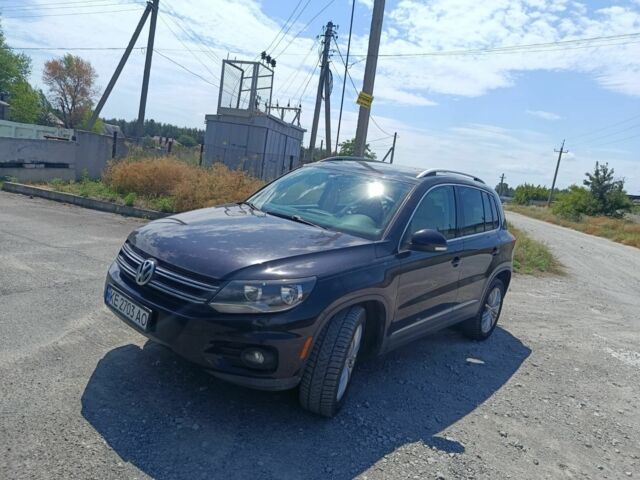 Черный Фольксваген Тигуан, объемом двигателя 2 л и пробегом 179 тыс. км за 11700 $, фото 2 на Automoto.ua