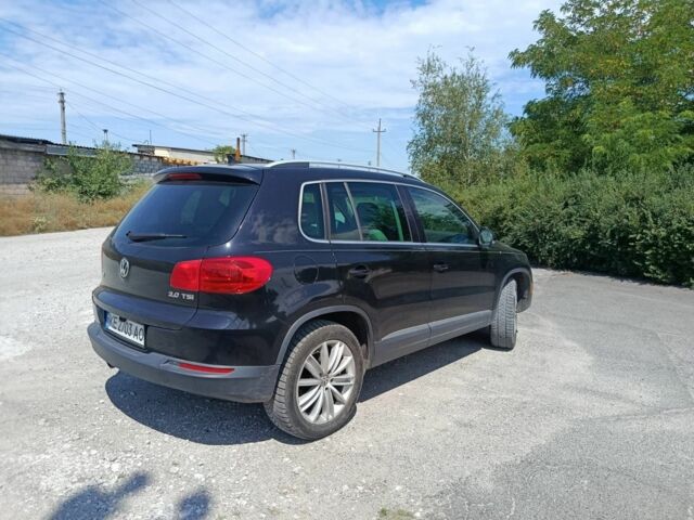 Черный Фольксваген Тигуан, объемом двигателя 2 л и пробегом 179 тыс. км за 11700 $, фото 4 на Automoto.ua