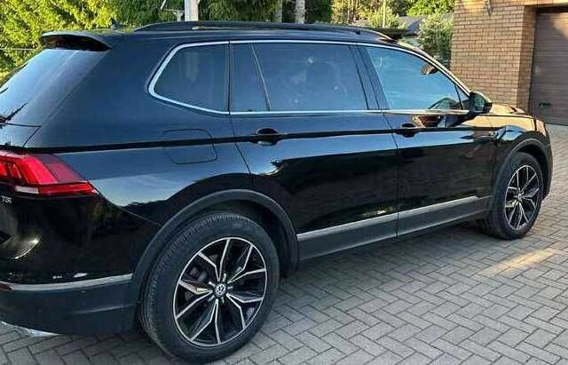 Черный Фольксваген Тигуан, объемом двигателя 2 л и пробегом 98 тыс. км за 15000 $, фото 3 на Automoto.ua