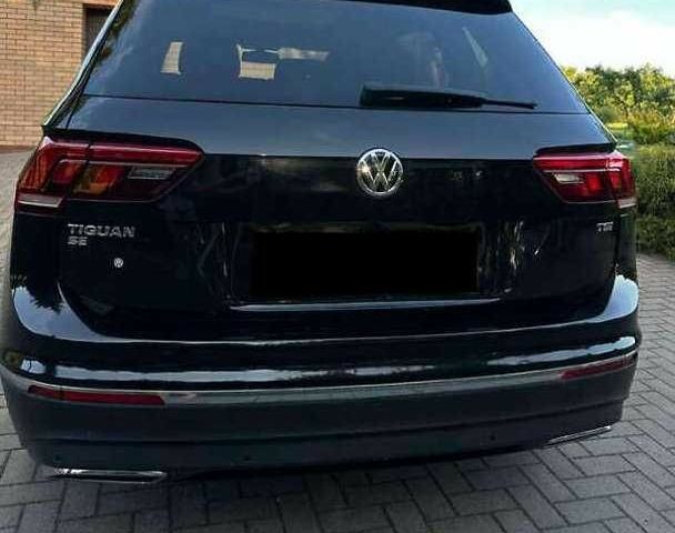 Черный Фольксваген Тигуан, объемом двигателя 2 л и пробегом 98 тыс. км за 15000 $, фото 4 на Automoto.ua