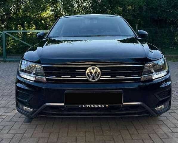 Черный Фольксваген Тигуан, объемом двигателя 2 л и пробегом 98 тыс. км за 15000 $, фото 2 на Automoto.ua