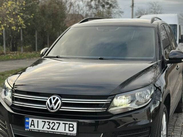 Черный Фольксваген Тигуан, объемом двигателя 2 л и пробегом 107 тыс. км за 13600 $, фото 2 на Automoto.ua