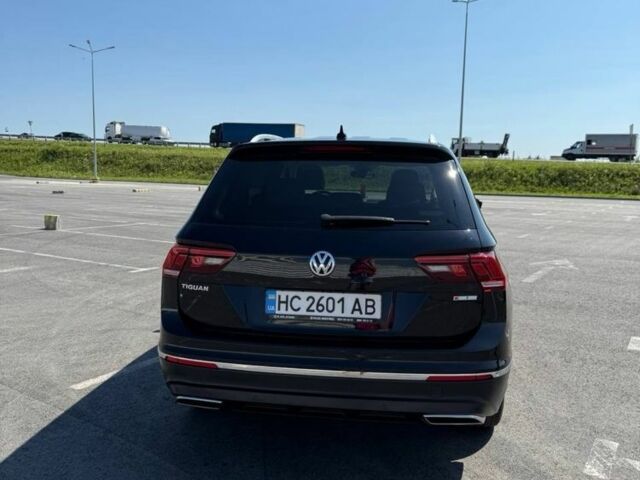 Черный Фольксваген Тигуан, объемом двигателя 2 л и пробегом 160 тыс. км за 24200 $, фото 2 на Automoto.ua